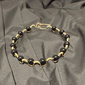 Sophisticated Black and Gold Bracelet